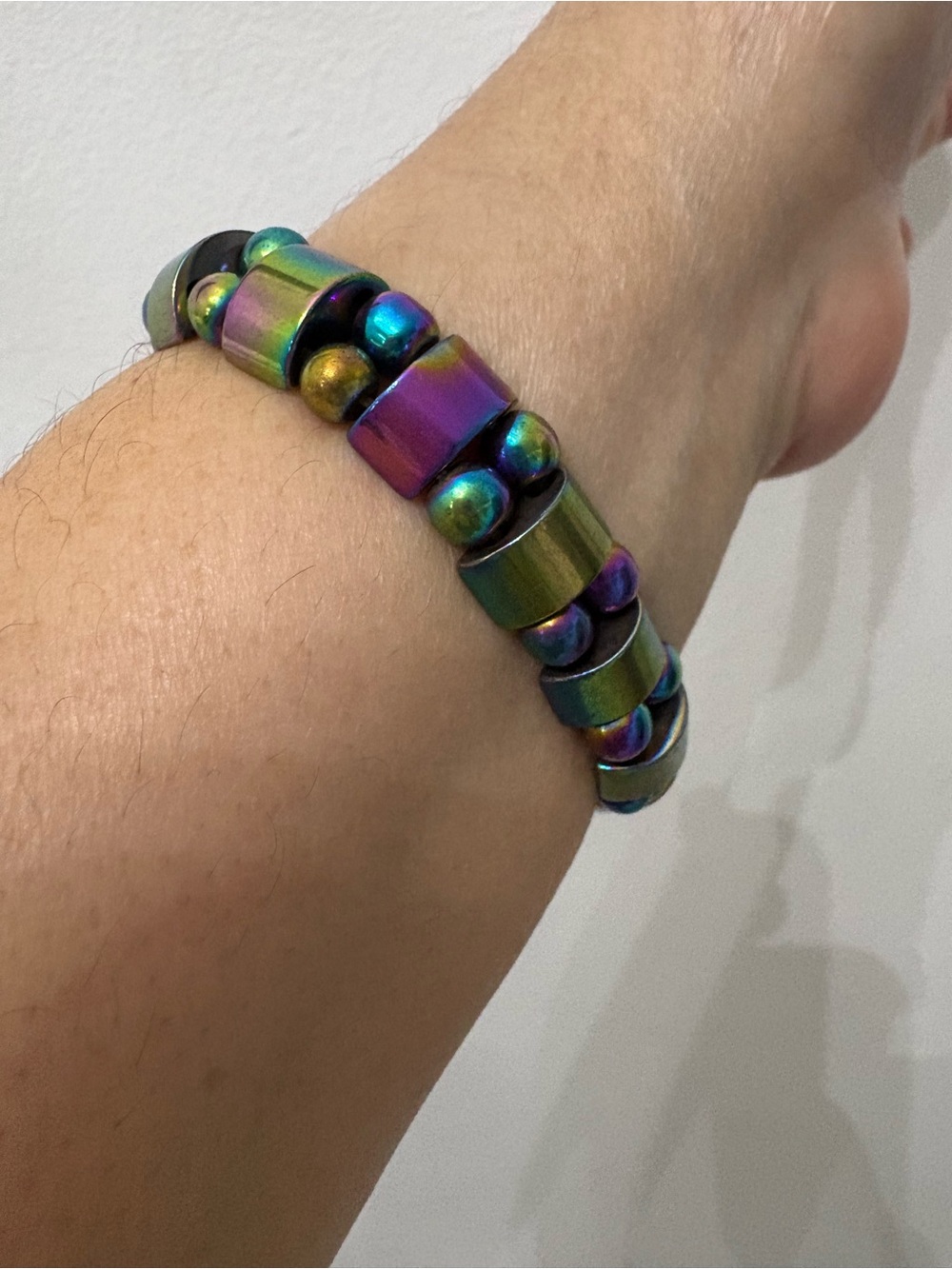 Multi-colored hematite magnetic bracelet with iridescent rectangular and spheric